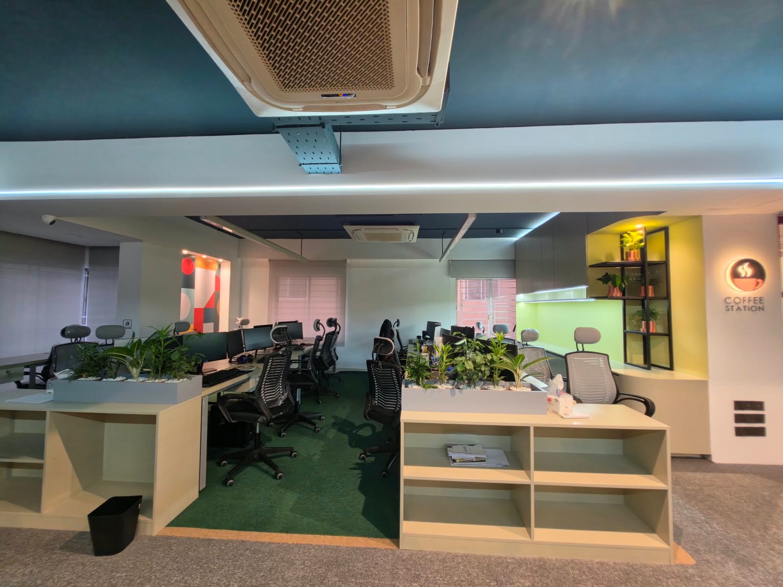 Rows of IMPIT workstations on the open floor